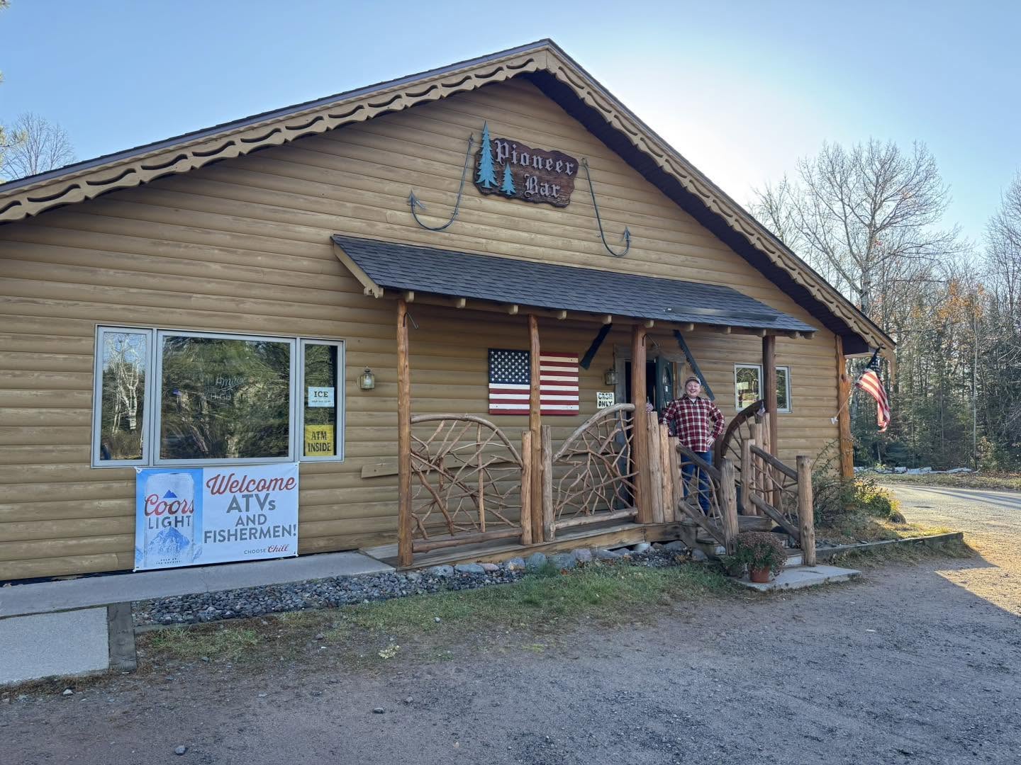 The Pioneer Bar's log building and front porch